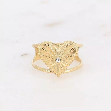 Ring - radiant heart motif and zirconium oxide.