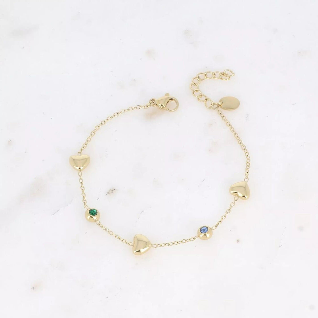Bracelet - hearts and zirconium oxides.
