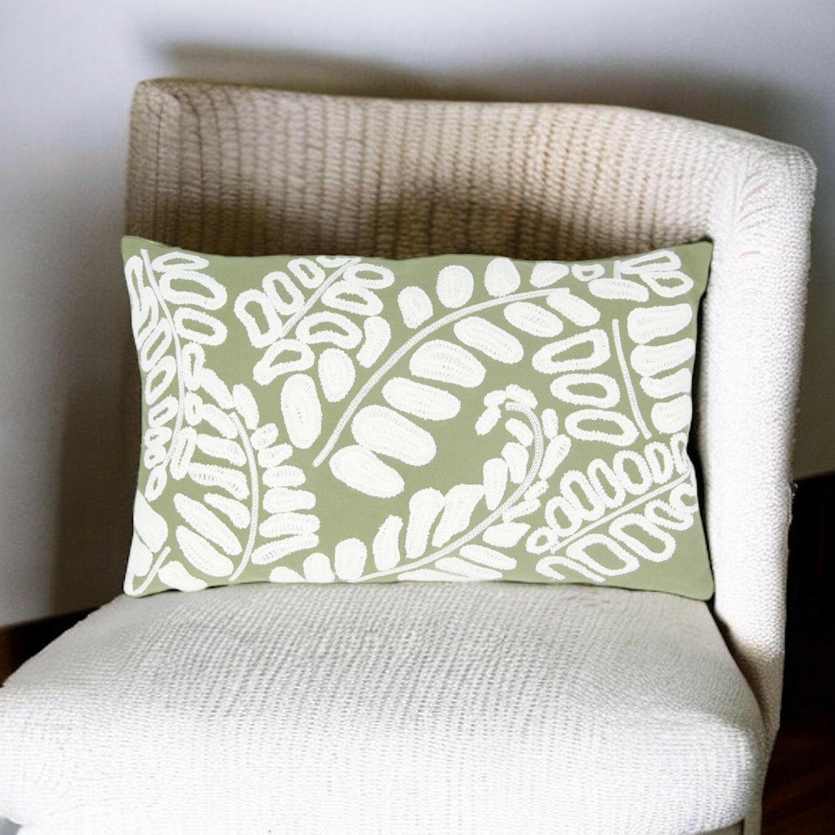 Green and White Embroidered Floral Cushion.
