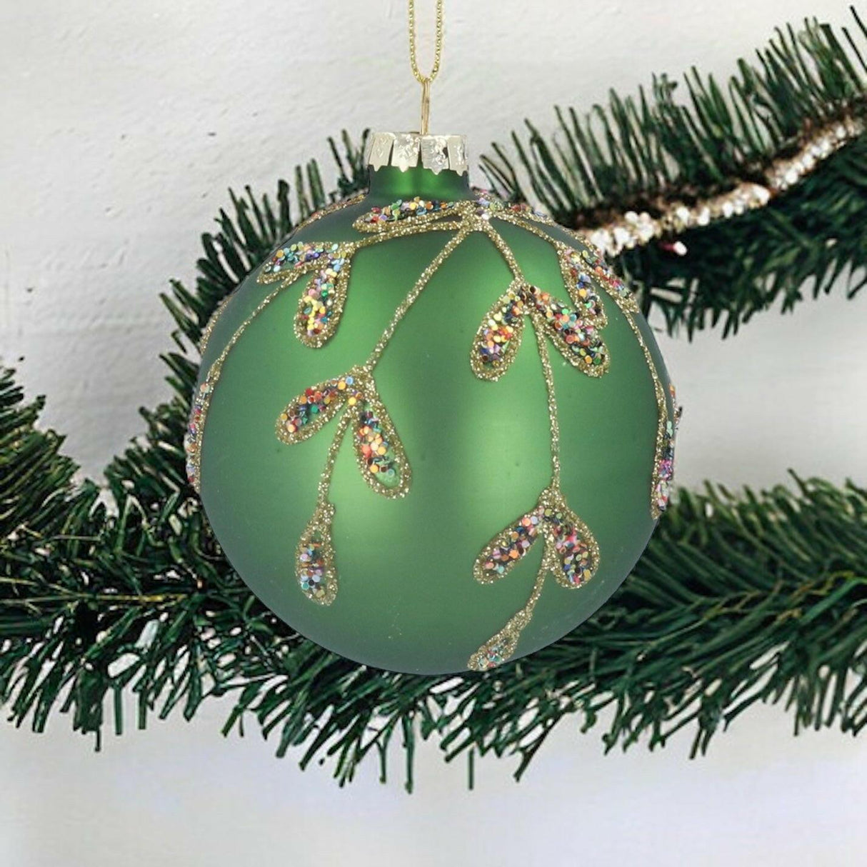 Green Glass Bauble with Gold Leaves.