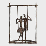 Couple on a Swing Cast Bronze Sculpture.