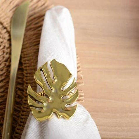 Set of Four Gold Palm Leaf Napkin Rings.