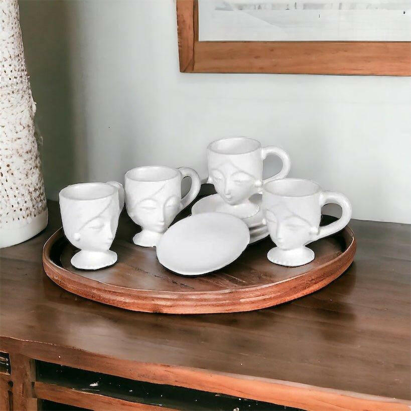 White Face Cup and Saucer.